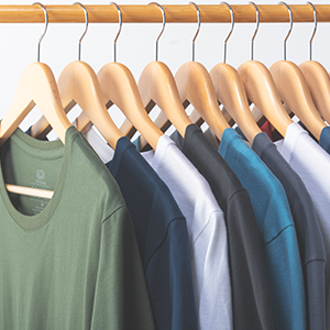 crafted comfort collection of shirts on a hanging rack